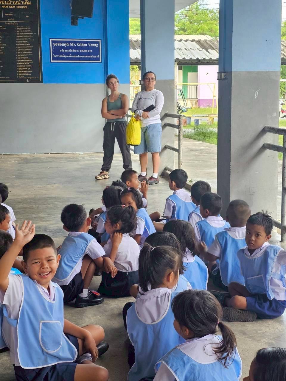 Students in blue smocks
